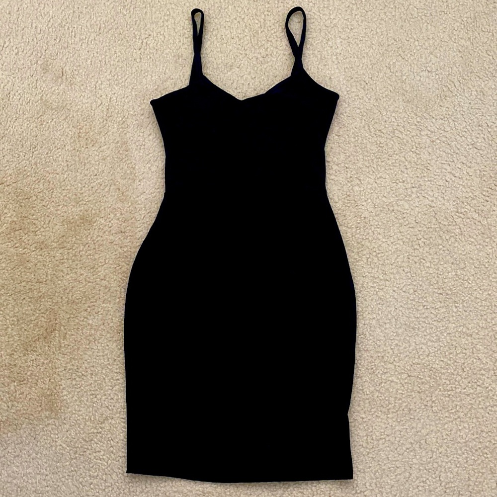 Fabletics dress. Athletic material -dress up or down. Never worn.